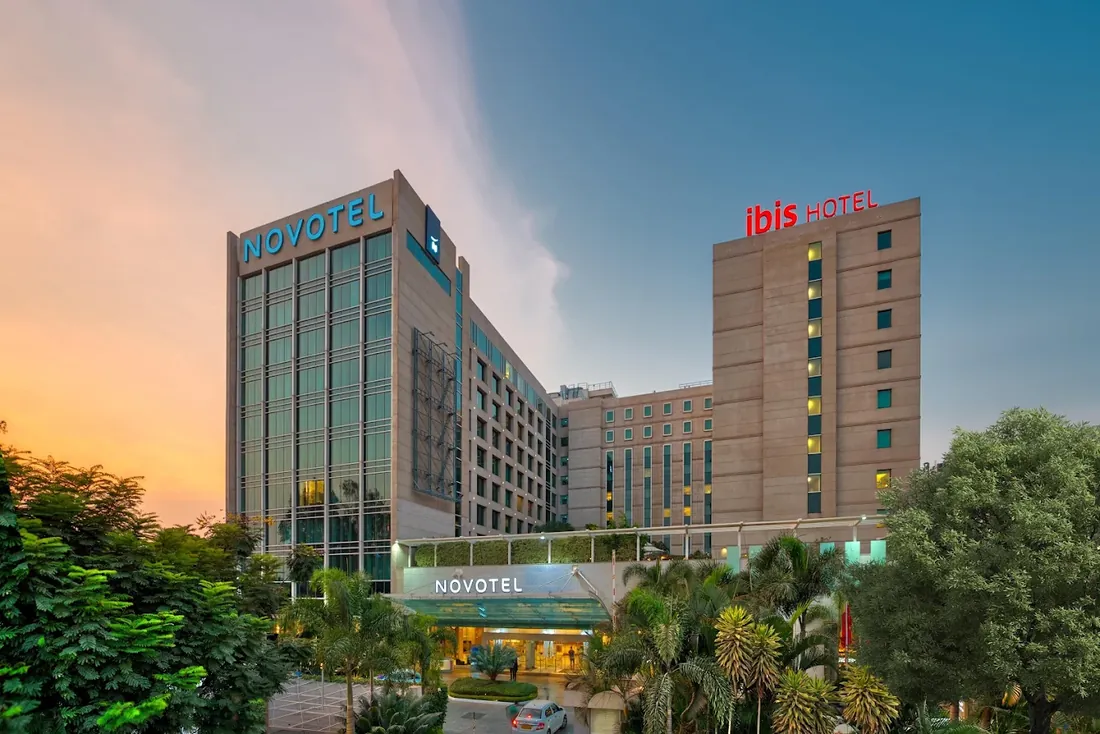 Novotel and ibis hotel towers, Bangalore, at dusk